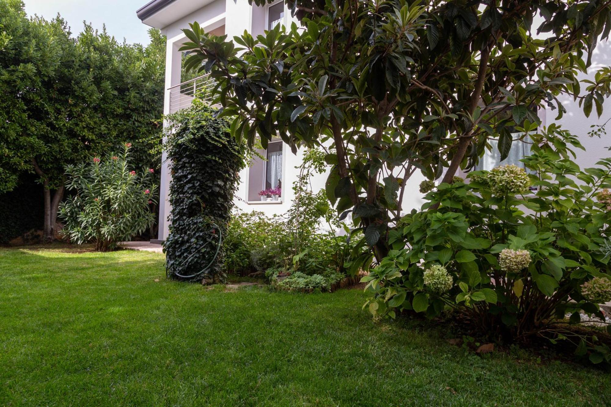 Appartamento Con Giardino Le Querce Sistiana Buitenkant foto